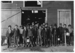 Lewis Hine child labor: 5 P.M. Boys going home from Monongah Glass Works. A native remarked "De place is lousey wid kids." (See #188.) Location: Fairmont, West Virginia.