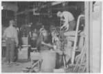Lewis Hine child labor: Night scene in Cumberland Glass Works, Bridgeton, N.J. Location: Bridgeton, New Jersey.