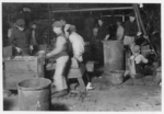 Lewis Hine child labor: Day scene, Wheaton Glass Works. Location: Millville, New Jersey.