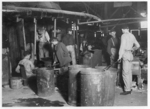 Lewis Hine child labor: Day scene. Wheaton Glass Works Millville, N.J. Location: Millville, New Jersey.