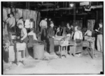 Lewis Hine child labor: Night scene in Cumberland Glass Works, Bridgeton, N.J. Location: Bridgeton, New Jersey