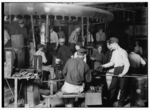 Lewis Hine child labor: Night shift in Wheaton Glass Works, Millville, N.J. This is typical of night shifts in Jersey. Location: Millville, New Jersey.