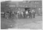 Lewis Hine child labor: Some of night shift waiting to go to work. Cumberland Glass Works, Bridgeton, N.J. One boy is 13 years old. Location: Bridgeton, New Jersey. Lewis Hine child labor: Some of night shift waiting to go to work. Cumberland Glass Works, Bridgeton, N.J. One boy is 13 years old. Location: Bridgeton, New Jersey.