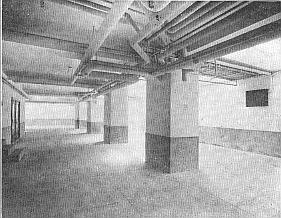 View of basement lit with American 3-Way vault lights