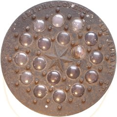 Smith & Lovett coal-hole cover with bull's-eye lenses