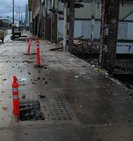 Hollow sidewalks on Weber St. in Stockton, California being demolished